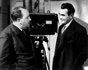 Sabotage (1936) - on set - On set photograph of Alfred Hitchcock and Oskar Homolka, taken during the filming of ''Sabotage'' (1936).