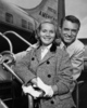 North by Northwest (1959) - photograph - Photograph of Eva Marie Saint and Cary Grant at La Guardia Airport, New York City, boarding a flight to Chicago.