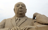Weston-super-Mare Sand Sculpture Festival (2013) - Photograph of a sand sculpture of Alfred Hitchcock at the Weston-super-Mare Sand Sculpture Festival in March 2013.