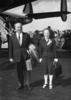 Alfred and Alma Hitchcock (1956) - Photograph of Alma and Alfred Hitchcock leaving Rome to fly to South Africa to scout locations for ''Flamingo Feather'', taken in June 1956.